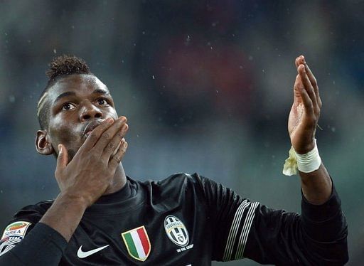 Juventus&#039; Paul Pogba celebrates after scoring