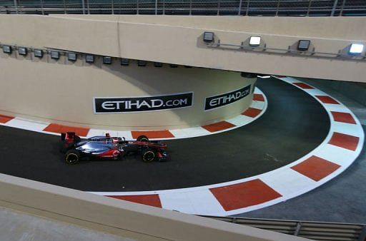 McLaren Mercedes&#039; British driver Jenson Button leaves the pits