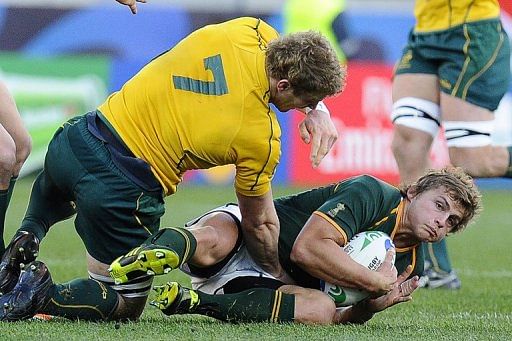Springboks&#039; upcoming star Patrick Lambie (R), seen here during a match against Australia, in 2011