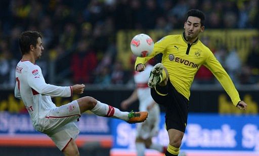 Stuttgart&#039;s striker Martin Harnik (L) and Dortmund&#039;s midfielder Ilkay Guendogan fight for the ball