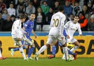 Swansea City's midfielder Pablo Hernandez (L) scores against Chelsea