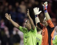 Aston Villa's goalkeeper Brad Guzan (R) and striker Gabriel Agbonlahor celebrate