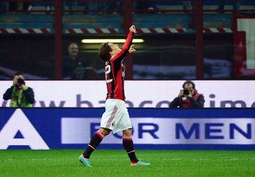 AC Milan&#039;s forward Bojan Krkic (C) celebrates after scoring