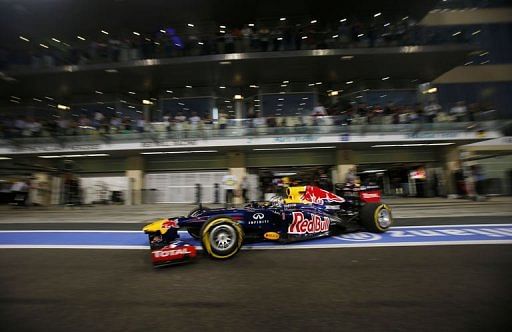 Red Bull Racing&#039;s German driver Sebastian Vettel drives in the pits