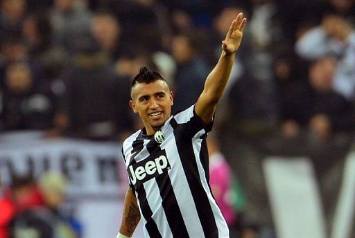 Juventus&#039; midfielder Arturo Vidal celebrates after scoring