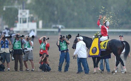 Jockey Brian Hernandez on Fort Larned celebrates his victory at the Breeders&#039; Cup Classic