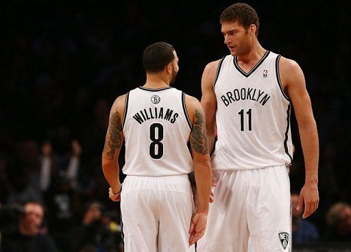 Brook Lopez scored 27 points helping the Brooklyn Nets to a 107-100 victory over Toronto