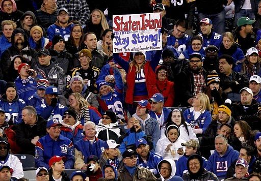 A fan holds a sign of encouragement for the Staten Island Borough of New York City