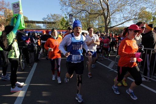 Many put on the race numbers they would have worn in the marathon