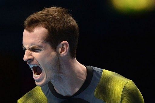 Andy Murray celebrates winning a point on his way to beating Tomas Berdych