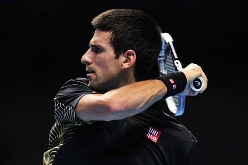 Serbia's Novak Djokovic returns against France's Jo-Wilfried Tsonga