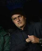 Late Ozil strike earns vital point for Madrid