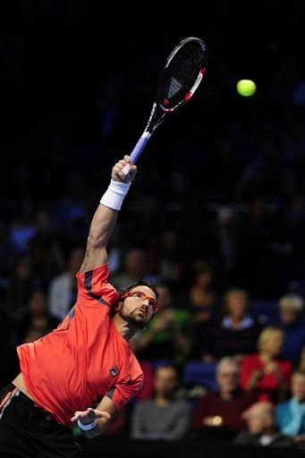 Janko Tipsarevic, pictured, was defeated by Roger Federer in two sets at London's O2 Arena on Tuesday