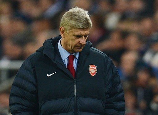 Arsenal&#039;s French head coach Arsene Wenger looks dejected during Tuesday&#039;s match away to Schalke 04