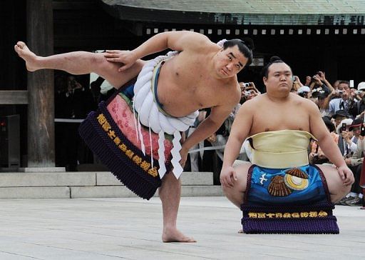 Mongolian wrestler Harumafuji (left) was promoted to the highest rank &#039;of yokozuna&#039; in September