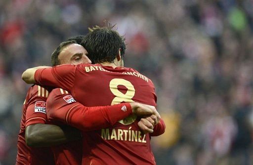 Bayern players celebrate a goal during the German first division match against Eintracht Frankfurt