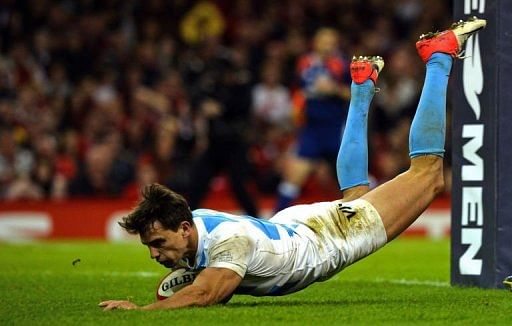 Argentina&#039;s wing Juan Imhoff scores a try