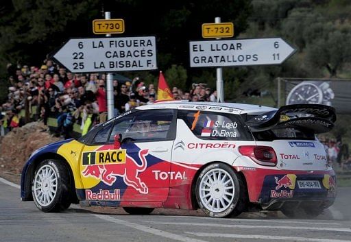 Sebastian Loeb from France and his co-driver Daniel Elena drive