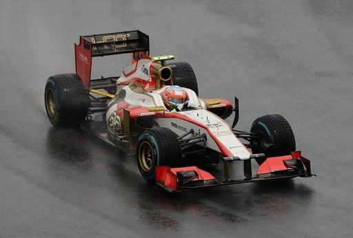 HRT F1 Team&#039;s Indian driver Narain Karthikeyan drives at the Hockenheimring circuit in July