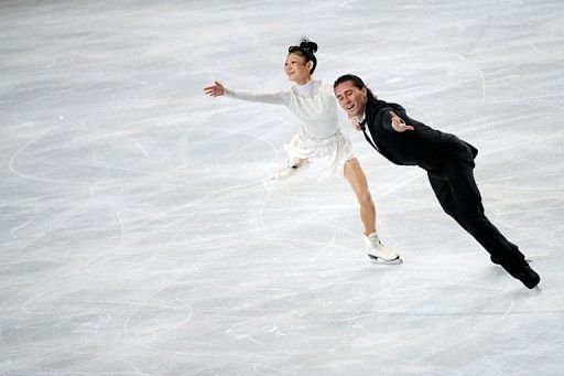 Yuko Kavaguti and Alexander Smirnov of Russia perform in their pairs short program