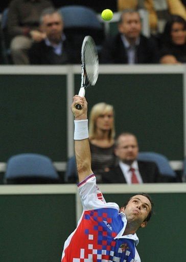 Radek Stepanek of Czech Republic serves a ball