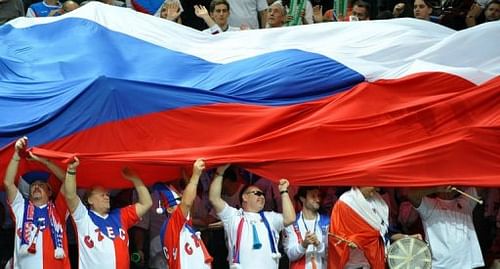 Czech fans cheer after Radek Stepanek and Tomas Berdych won thier double tennis match