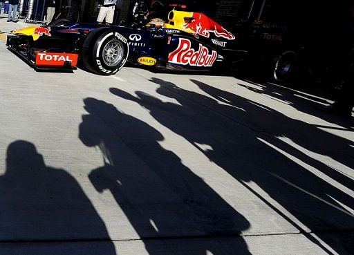 Germany&#039;s Sebastian Vettel of Red Bull racing drives out of the pits