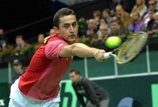 Spanish tennis player Nicolas Almagro returns a ball to Radek Stepanek of Czech Republic