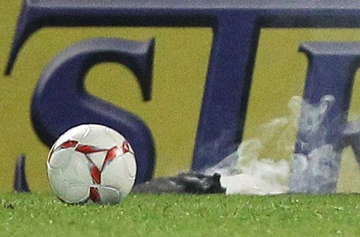 A Russian Premier League game was abandoned after a firecracker struck a goalkeeper