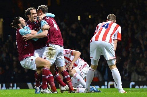 West Ham&#039;s Joey O&#039;Brien (2nd L) celebrates after scoring