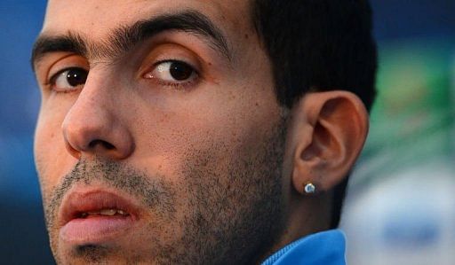 Manchester City&#039;s Carlos Tevez attends a press conference at the Carrington training complex
