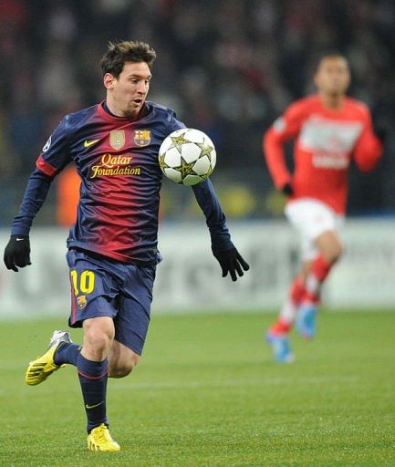 Barcelona&#039;s Lionel Messi controls the ball