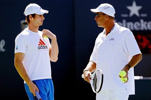 Andy Murray of Great Britain talks with his coach Ivan Lendl