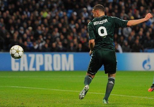 Real Madrid&#039;s Karim Benzema scores the opening goal