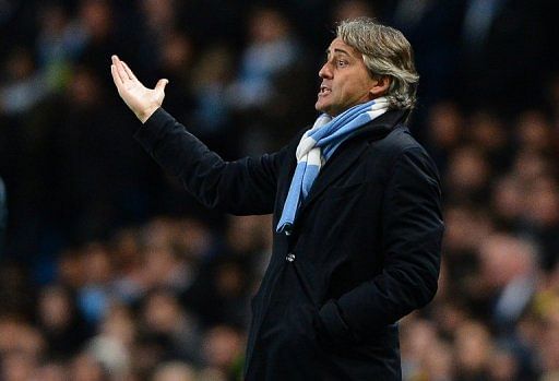 City lead the Premier League but Mancini says they are not yet major players on the continental scene