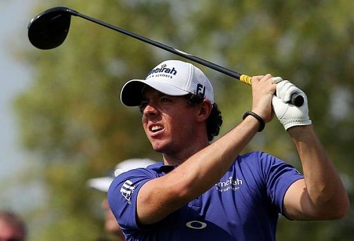 Rory McIlroy plays a shot during the first round of the DP World Tour Championship in the Gulf emirate of Dubai