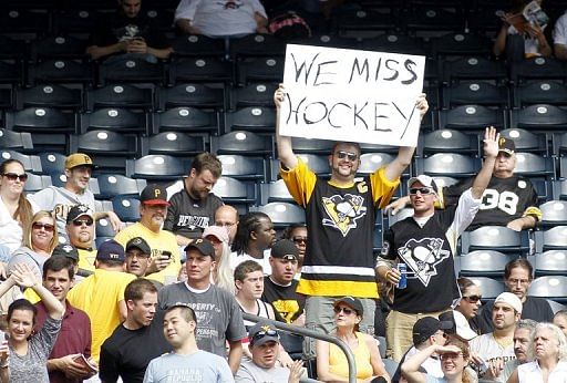 A Pittsburgh Penguins fan expresses himself during the game between the Pittsburgh Pirates and the Atlanta Braves