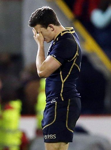 Dejected Scotland player Matthew Scott