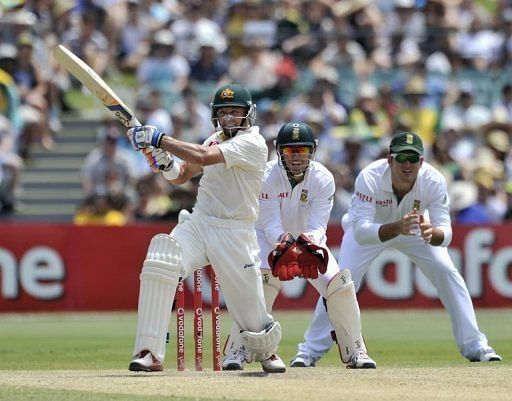 Mike Hussey (L), chasing his 3rd successive century in the series, was out in the over before lunch for 54 off 95 balls
