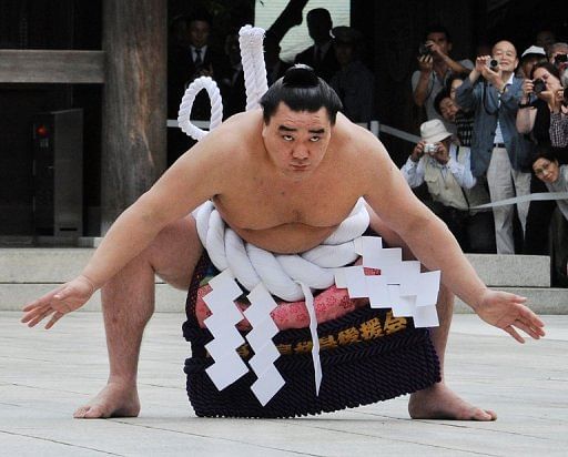 Harumafuji ended his first regular 15-day basho since his September promotion with a miserable nine wins and six losses