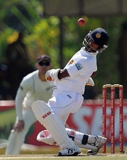 Nuwan Kulasekara is on the receiving end after taking two kew New Zealand wickets earlier in the day