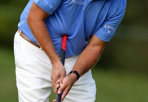 Phil Mickelson attempts a putt with a belly putter in 2011