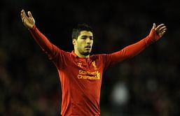 Luis Suarez toils away thanklessly at Liverpool