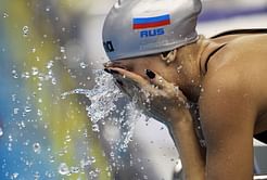 Swimmer banned for breaching doping rule