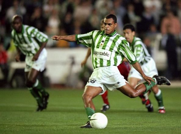 Denilson of Real Betis scores a penalty