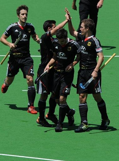 In a Pool A match, Germany held off the fast-finishing New Zealand after scoring all their goals in the first half