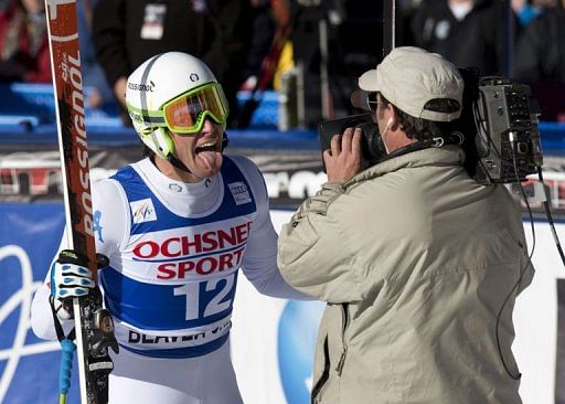 Matteo Marsaglia of Italy sticks his tongue out at the cameraman after winning