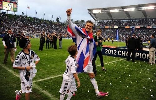 David Beckham salutes the fans at the end of his last match for Los Angeles Galaxy