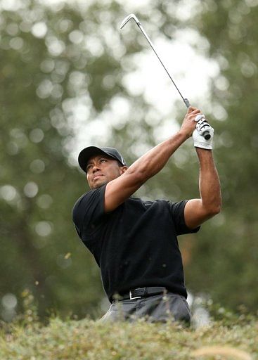 Tournament host Tiger Woods carded his second straight 69 at the Sherwood Country Club