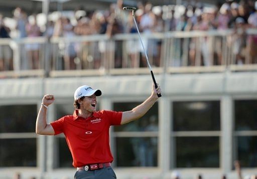 Rory McIlroy celebrates winning the 94th PGA Championship